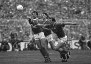 16 September 1990; John O'Driscoll of Cork in action against David Beggy and Gerry McEntee of Meath during the All-Ireland Senior Football Championship Final match between Cork and Meath at Croke Park in Dublin. Photo by Ray McManus/Sportsfile