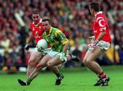 26 September 1999; Evan Kelly of Meath in action against Eoin Sexton, left, and Ciaran O'Sullivan of Cork during the GAA Football All-Ireland Senior Championship Final match between Meath and Cork at Croke Park in Dublin. Photo by Brendan Moran/Sportsfile