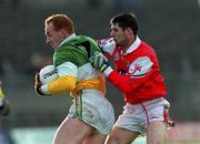 31 October 1999; James Stewart of Offaly in action against Nicky Malone of Louth during the National Football League match between Offaly and Louth at O'Connor Park in Tullamore, Offaly. Photo by Damien Eagers/Sportsfile