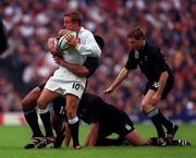 9 October 1999; Jonny Wilkinson of England in action against Alama Ieremia of New Zealand during the Rugby World Cup match between England and New Zealand at Twickenham Stadium in London, England. Photo by Brendan Moran/Sportsfile