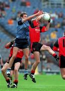29 August 1999; Louis Sloan of Down in action against Kevin Devine of Dublin during the All-Ireland Minor Football Championship Semi-Final match between Dublin and Down at Croke Park in Dublin. Photo by Damien Eagers/Sportsfile