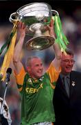 26 September 1999; Ollie Murphy of Meath lifts the Sam Maguire Cup following the GAA Football All-Ireland Senior Championship Final match between Meath and Cork at Croke Park in Dublin. Photo by Ray McManus/Sportsfile