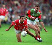 22 August 1999; Séan Og O'Hailpin of Cork in action against Maurice Sheridan of Mayo during the All-Ireland Senior Football Championship Semi-Final match between Cork and Mayo at Croke Park, Dublin. Photo by Matt Browne/Sportsfile