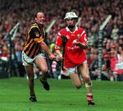 12 September 1999; Cork's Timmy McCarthy races clear of Kilkenny's Andy Comerford. Cork v Kilkenny, All-Ireland Hurling Final, Croke Park, Dublin. Picture credit; David Maher/SPORTSFILE