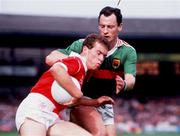 17 September 1989; Paul McGrath of Cork in action against Dermot Flanagan of Mayo during the All-Ireland Senior Football Championship Final between Cork and Mayo at Croke Park in Dublin. Photo Ray McManus/Sportsfile