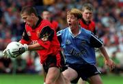 29 August 1999; Ronan Sexton of Down in action against Anthony Holly of Dublin during the All-Ireland Minor Football Championship Semi-Final match between Dublin and Down at Croke Park in Dublin. Photo by Damien Eagers/Sportsfile