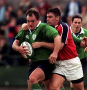 10 September 1999; Ross Nesdale of Ireland is tackled by David Wallace of Munster during the Representative Match between Munster and Ireland XV at Musgrave Park in Cork. Photo by Matt Browne/Sportsfile