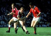 2 September 1990; Tomás Mulcahy of Cork in action against Sean Treacy and Ollie Kilkenny of Galway during the All-Ireland Senior Hurling Championship Final match between Cork and Galway at Croke Park in Dublin. Photo by Ray McManus/Sportsfile