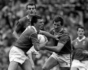 18 September 1988; Tony Davis of Cork in action against Mattie McCabe of Meath during the All-Ireland Senior Football Championship Final between Meath and Cork at Croke Park in Dublin. Photo by Ray McManus/Sportsfile