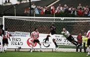14 September 2006; Fabrice Pancrate, Paris St Germain, forces David Forde, Derry City into a save. UEFA Cup, First Round, First leg fixture, Derry City v Paris St Germain, Brandywell, Derry. Picture credit: Oliver McVeigh / SPORTSFILE