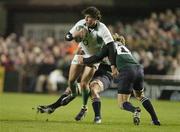 11 November 2006; Shane Horgan, Ireland, is tackled by Francois Steyn, right, and Juan Smith, South Africa. Autumn Internationals, Ireland v South Africa, Lansdowne Road, Dublin. Picture credit: Pat Murphy / SPORTSFILE