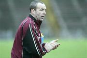 12 November 2006; Cushendall manager Fergus McAllister cheers on his team. AIB Ulster Senior Hurling Championship Final Replay, Cushendall v Kevin Lynch's, Casement Park, Belfast. Picture credit: Russell Pritchard / SPORTSFILE