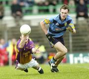 12 November 2006; Richie Brady, Wolfe Tones, in action against James Sherry, UCD. AIB Leinster Senior Club Football Championship, Quarter-Final, Wolfe Tones v UCD, Pairc Tailteann, Navan, Co. Meath. Picture credit: Brian Lawless / SPORTSFILE