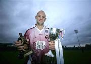 12 November 2006; Cushendall's Declan McKillop with the Four Seasons Trophy and his Man of the Match award. AIB Ulster Senior Hurling Championship Final Replay, Cushendall v Kevin Lynch's, Casement Park, Belfast. Picture credit: Russell Pritchard / SPORTSFILE