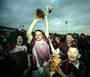 12 November 2006; Cushendall captain Aidan DeLargy with the Four Seasons Trophy. AIB Ulster Senior Hurling Championship Final Replay, Cushendall v Kevin Lynch's, Casement Park, Belfast. Picture credit: Russell Pritchard / SPORTSFILE