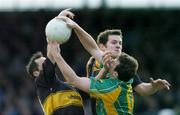 12 November 2006; Denis O'Dwyer, South Kerry, fields a ball ahead of Batt Moriarty, left, and Eoin Brosnan, Dr. Crokes. Kerry Senior Football Championship Final, Dr. Crokes v South Kerry, Fitzgerald Stadium, Killarney, Co. Kerry. Picture credit: Brendan Moran / SPORTSFILE
