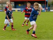20 August 2014; Sam Power, aged 7, from Clontarf, in action during The Herald Leinster Rugby Summer Camps in Clontarf RFC, Dublin. Picture credit: Piaras O Midheach / SPORTSFILE