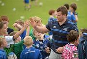 20 August 2014; Leinster and Ireland rugby player Jack McGrath greets participants during The Herald Leinster Rugby Summer Camps in Clontarf RFC, Dublin. Picture credit: Piaras O Midheach / SPORTSFILE