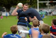 20 August 2014; Leinster and Ireland rugby players Jack McGrath and Devin Toner interacting with participants during The Herald Leinster Rugby Summer Camps in Clontarf RFC, Dublin. Picture credit: Piaras O Midheach / SPORTSFILE