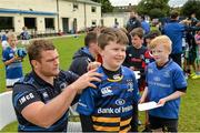 20 August 2014; Harry Brewer, aged 9, from Sutton, gets an autograph from Leinster and Ireland rugby player Jack McGrath during The Herald Leinster Rugby Summer Camps in Clontarf RFC, Dublin. Picture credit: Piaras O Midheach / SPORTSFILE