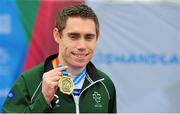 21 August 2014; Team Ireland's Jason Smyth, from Eglinton, Co. Derry, with his gold medal after winning the men's 200m - T12 final, in a time of 21.67. 2014 IPC Athletics European Championships, Swansea University, Swansea, Wales. Picture credit: Chris Vaughan / SPORTSFILE