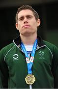 21 August 2014; Team Ireland's Jason Smyth, from Eglinton, Co. Derry, with his gold medal after winning the men's 200m - T12 final, in a time of 21.67. 2014 IPC Athletics European Championships, Swansea University, Swansea, Wales. Picture credit: Chris Vaughan / SPORTSFILE