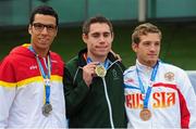 21 August 2014; Team Ireland's Jason Smyth, from Eglinton, Co. Derry, with his gold medal after winning the men's 200m - T12 final, in a time of 21.67, with silver medallist Joan Munar Martinez, left, Spain, and bronze medallist Artem Loginov, right, Russia. 2014 IPC Athletics European Championships, Swansea University, Swansea, Wales. Picture credit: Chris Vaughan / SPORTSFILE