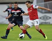 22 August 2014; Christy Fagan, St Patrick's Athletic, in action against Brian Gannon, Shelbourne. FAI Ford Cup, 3rd Round, St Patrick's Athletic v Shelbourne, Richmond Park, Dublin. Picture credit: David Maher / SPORTSFILE