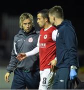 22 August 2014; St Patrick's Athletic's Keith Fahey, centre, with Shelbourne fitness coach and former Mayo footballer Conor Mortimer, left, at the end of the game. FAI Ford Cup, 3rd Round, St Patrick's Athletic v Shelbourne, Richmond Park, Dublin. Picture credit: David Maher / SPORTSFILE