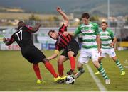 22 August 2014; David O'Connor, Shamrock Rovers, in action against Don Cowan, 17, and Stepehn Rice, Longford Town. FAI Ford Cup, 3rd Round, Longford Town, Tallaght Stadium, Tallaght, Co. Dublin. Picture credit: Ray Lohan / SPORTSFILE
