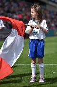 17 August 2014; Liberty Insurance flagbearer Isabel Goggins, age 8, from Blackpool, Cork, at the GAA All Ireland Senior Championship Semi-Final between Cork and Tipperary in Croke Park. GAA Hurling All-Ireland Senior Championship Semi-Final, Cork v Tipperary. Croke Park, Dublin. Picture credit: Brendan Moran / SPORTSFILE