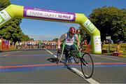 23 August 2014; Wheelchair competitor Turlough Cotter, from Team Carrie, Co. Louth, in the Frank Duffy 10 Mile SSE Airtricity Dublin Race Series 2014. Phoenix Park, Dublin. Picture credit: Pat Murphy / SPORTSFILE