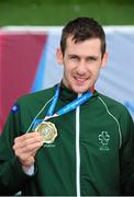 23 August 2014; Team Ireland's Michael McKillop, from Newtownabbey, Co. Antrim, with his gold medal after winning the T38 men's 1,500m final, in a time of 4:16.73. 2014 IPC Athletics European Championships, Swansea University, Swansea, Wales. Picture credit: Chris Vaughan / SPORTSFILE