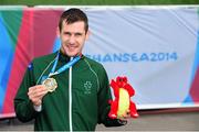 23 August 2014; Team Ireland's Michael McKillop, from Newtownabbey, Co. Antrim, with his gold medal after winning the T38 men's 1,500m final, in a time of 4:16.73. 2014 IPC Athletics European Championships, Swansea University, Swansea, Wales. Picture credit: Chris Vaughan / SPORTSFILE