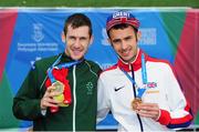23 August 2014; Team Ireland's Michael McKillop, left, from Newtownabbey, Co. Antrim, with his gold medal after winning the T38 men's 1,500m final, in a time of 4:16.73 with bronze medallist Dean Miller, Great Britain. 2014 IPC Athletics European Championships, Swansea University, Swansea, Wales. Picture credit: Chris Vaughan / SPORTSFILE