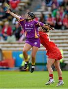 23 August 2014; Lisa Bolger, Wexford, in action against Joanne O'Callaghan, Cork. Liberty Insurance All-Ireland Senior Camogie Championship Semi-Final, Cork v Wexford, Semple Stadium, Thurles, Co. Tipperary. Picture credit: Diarmuid Greene / SPORTSFILE