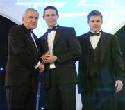 10 November 2006; Stephen Cluxton, Dublin receives his award from An Taoiseach Bertie Ahern, TD, in the company of Dessie Farrell, Chief Executive, GPA, at the 2006 Opel GPA Player of the Year Awards. Gaelic Player Assoication Awards, Citywest Hotel, Dublin. Picture credit: Brendan Moran / SPORTSFILE
