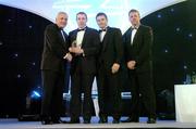 10 November 2006; Seamus Moynihan, Kerry, receives his award from An Taoiseach Bertie Ahern, TD, in the company of Dessie Farrell, Chief Executive, GPA and Dave Sheerin, Opel Ireland, at the 2006 Opel GPA Player of the Year Awards. Gaelic Player Assoication Awards, Citywest Hotel, Dublin. Picture credit: Brendan Moran / SPORTSFILE
