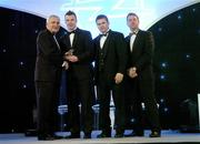10 November 2006; Ronan Clarke, Armagh, receives his award from An Taoiseach Bertie Ahern, TD, in the company of Dessie Farrell, Chief Executive, GPA and Dave Sheerin, Opel Ireland, at the 2006 Opel GPA Player of the Year Awards. Gaelic Player Assoication Awards, Citywest Hotel, Dublin. Picture credit: Brendan Moran / SPORTSFILE