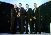 10 November 2006; Brian Murphy, Cork, receives his award from An Taoiseach Bertie Ahern, TD, in the company of Dessie Farrell, Chief Executive, GPA and Dave Sheerin, Opel Ireland, at the 2006 Opel GPA Player of the Year Awards. Gaelic Player Assoication Awards, Citywest Hotel, Dublin. Picture credit: Brendan Moran / SPORTSFILE