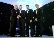 10 November 2006; Tommy Walsh, Kilkenny, receives his award from An Taoiseach Bertie Ahern, TD, in the company of Dessie Farrell, Chief Executive, GPA and Dave Sheerin, Opel Ireland, at the 2006 Opel GPA Player of the Year Awards. Gaelic Player Assoication Awards, Citywest Hotel, Dublin. Picture credit: Brendan Moran / SPORTSFILE