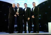 10 November 2006; Eoin Kelly, Tipperary, receives his award from An Taoiseach Bertie Ahern, TD, in the company of Dessie Farrell, Chief Executive, GPA and Dave Sheerin, Opel Ireland, at the 2006 Opel GPA Player of the Year Awards. Gaelic Player Assoication Awards, Citywest Hotel, Dublin. Picture credit: Brendan Moran / SPORTSFILE