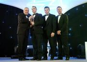10 November 2006; Darren Clarke, Louth, receives his Tommy Murphy Cup Footballer of the Year award from An Taoiseach Bertie Ahern, TD, in the company of Dessie Farrell, Chief Executive, GPA and Dave Sheerin, Opel Ireland, at the 2006 Opel GPA Player of the Year Awards. Gaelic Player Assoication Awards, Citywest Hotel, Dublin. Picture credit: Brendan Moran / SPORTSFILE