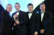 10 November 2006; Darren Clarke, Louth, receives his Tommy Murphy Cup, Footballer of the Year award from An Taoiseach Bertie Ahern, TD, in the company of Dessie Farrell, Chief Executive, GPA and Dave Sheerin, Opel Ireland, at the 2006 Opel GPA Player of the Year Awards. Gaelic Player Assoication Awards, Citywest Hotel, Dublin. Picture credit: Pat Murphy / SPORTSFILE