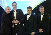 10 November 2006; Nicholas Murphy, Cork, receives his award from An Taoiseach Bertie Ahern, TD, in the company of Dessie Farrell, Chief Executive, GPA and Dave Sheerin, Opel Ireland, at the 2006 Opel GPA Player of the Year Awards. Gaelic Player Assoication Awards, Citywest Hotel, Dublin. Picture credit: Pat Murphy / SPORTSFILE