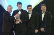 10 November 2006; Malachy Molloy, Antrim, receives his Christy Ring Cup Hurler of the Year award from An Taoiseach Bertie Ahern, TD, in the company of Dessie Farrell, Chief Executive, GPA and Dave Sheerin, Opel Ireland, at the 2006 Opel GPA Player of the Year Awards. Gaelic Player Assoication Awards, Citywest Hotel, Dublin. Picture credit: Pat Murphy / SPORTSFILE