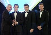 10 November 2006; Tommy Walsh, Kilkenny, receives his award from An Taoiseach Bertie Ahern, TD, in the company of Dessie Farrell, Chief Executive, GPA and Dave Sheerin, Opel Ireland, at the 2006 Opel GPA Player of the Year Awards. Gaelic Player Assoication Awards, Citywest Hotel, Dublin. Picture credit: Pat Murphy / SPORTSFILE