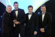 10 November 2006; Dan Shanahan, Waterford, receives his award from An Taoiseach Bertie Ahern, TD, in the company of Dessie Farrell, Chief Executive, GPA and Dave Sheerin, Opel Ireland, at the 2006 Opel GPA Player of the Year Awards. Gaelic Player Assoication Awards, Citywest Hotel, Dublin. Picture credit: Pat Murphy / SPORTSFILE