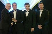 10 November 2006; Eoin Kelly, Tipperary, receives his award from An Taoiseach Bertie Ahern, TD, in the company of Dessie Farrell, Chief Executive, GPA and Dave Sheerin, Opel Ireland, at the 2006 Opel GPA Player of the Year Awards. Gaelic Player Assoication Awards, Citywest Hotel, Dublin. Picture credit: Pat Murphy / SPORTSFILE