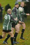 15 November 2006; Malcolm O'Kelly receives a pass from team-mate Peter Stringer during Ireland rugby squad training. St. Gerard's School, Bray, Co. Wicklow. Picture credit: Brian Lawless / SPORTSFILE